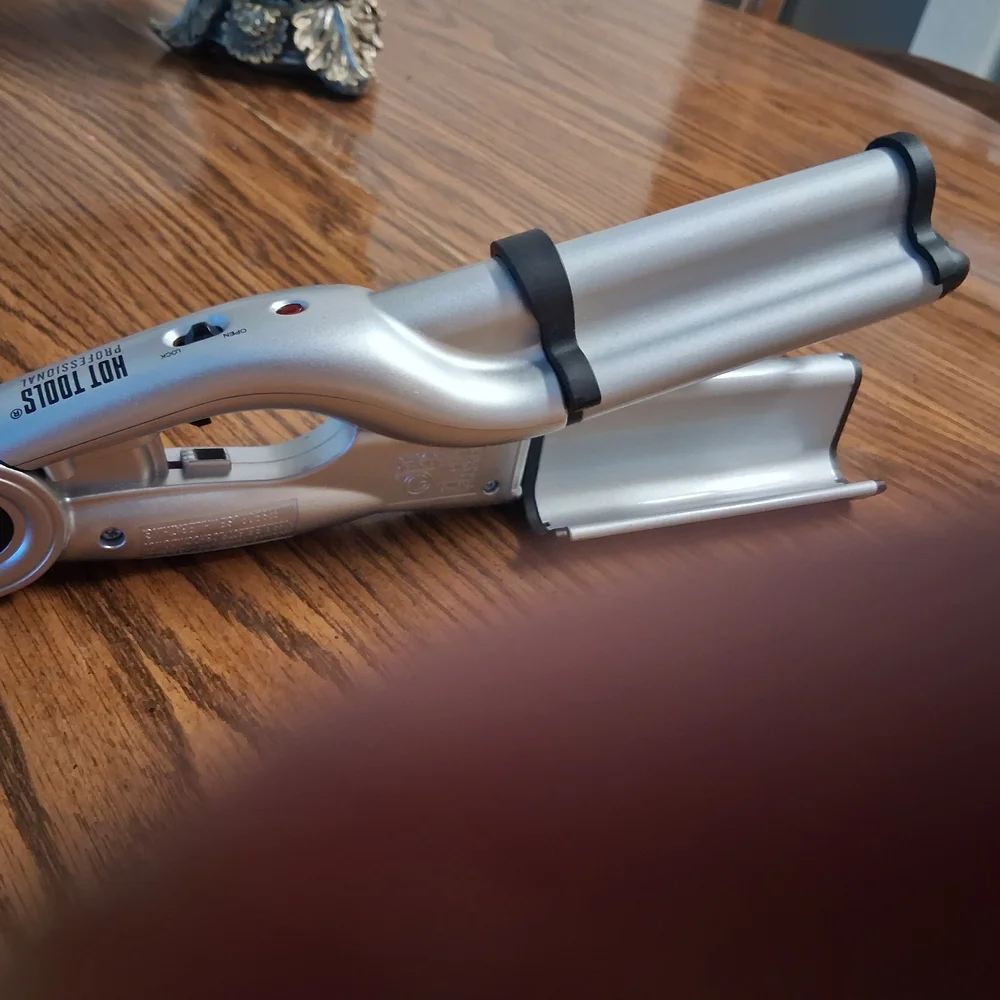 Sleek Silver Hair Styling Tool